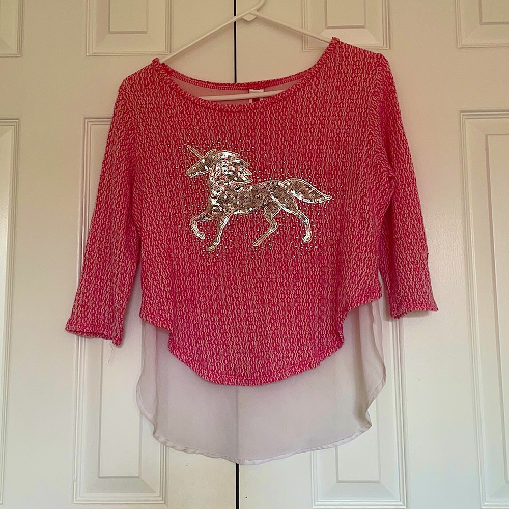 A beautiful sequined unicorn high low top!